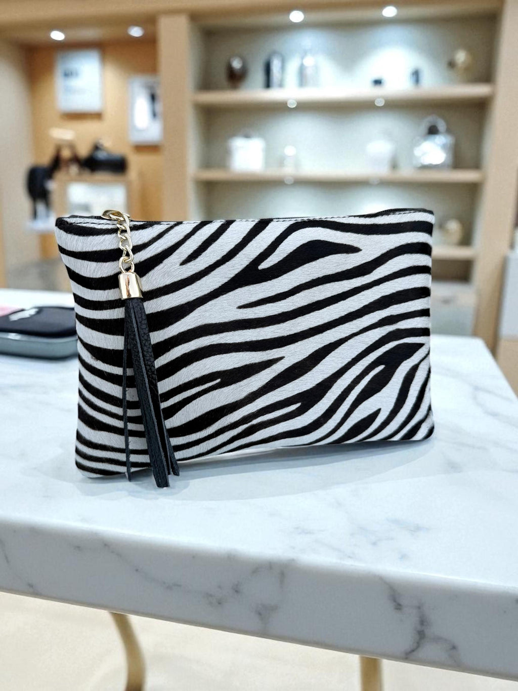 Zebra Print and Tassel clutch