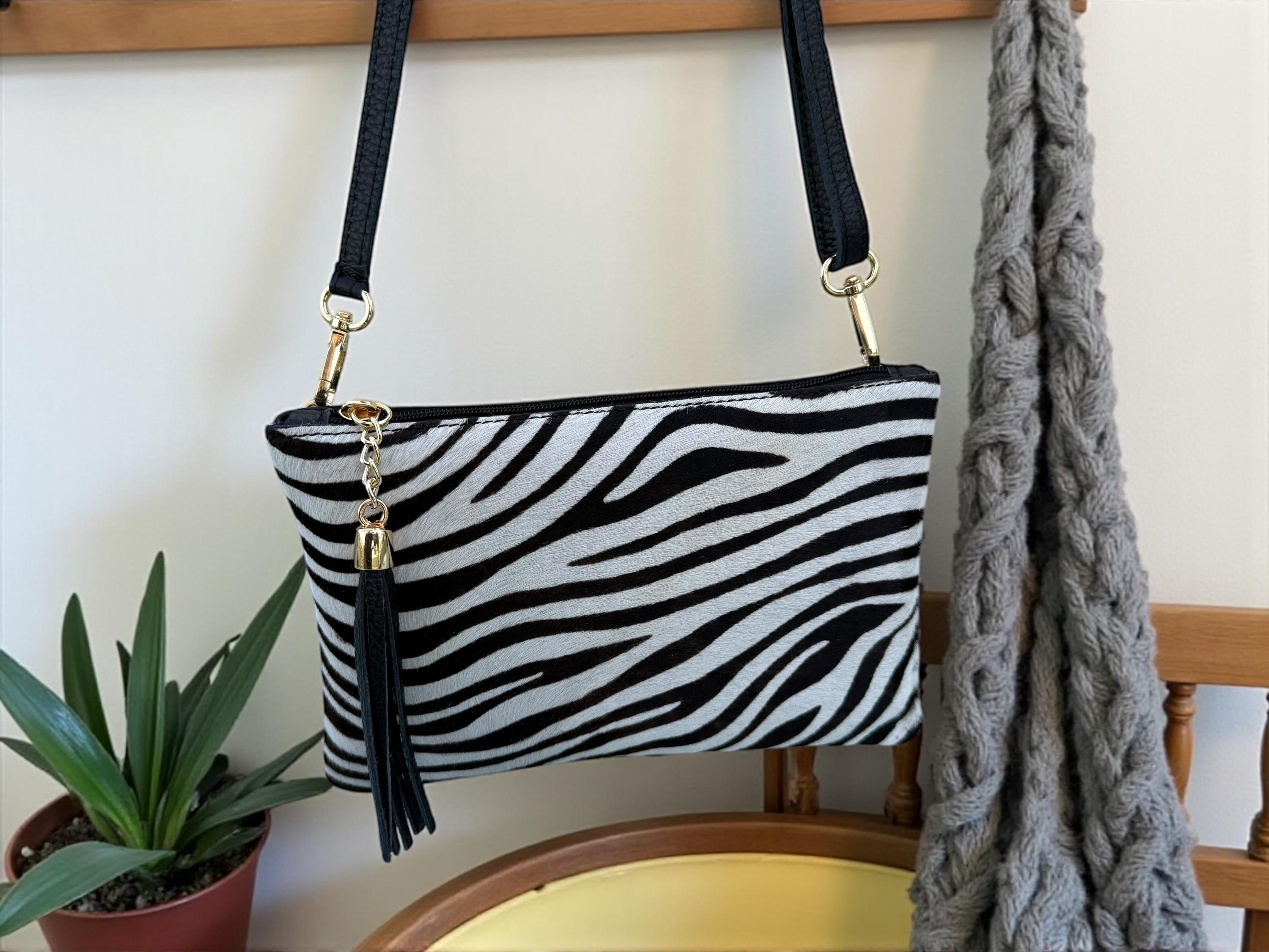 Zebra Print and Tassel clutch