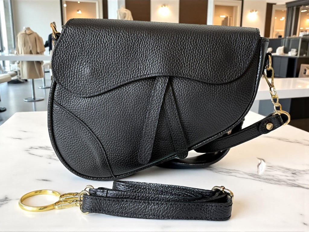 Asymmetric Genuine pebbled leather Saddle Flap Bag. Quite luxury