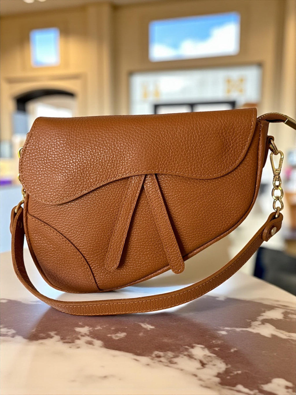 Asymmetric pebbled Leather Saddle Flap  Bag