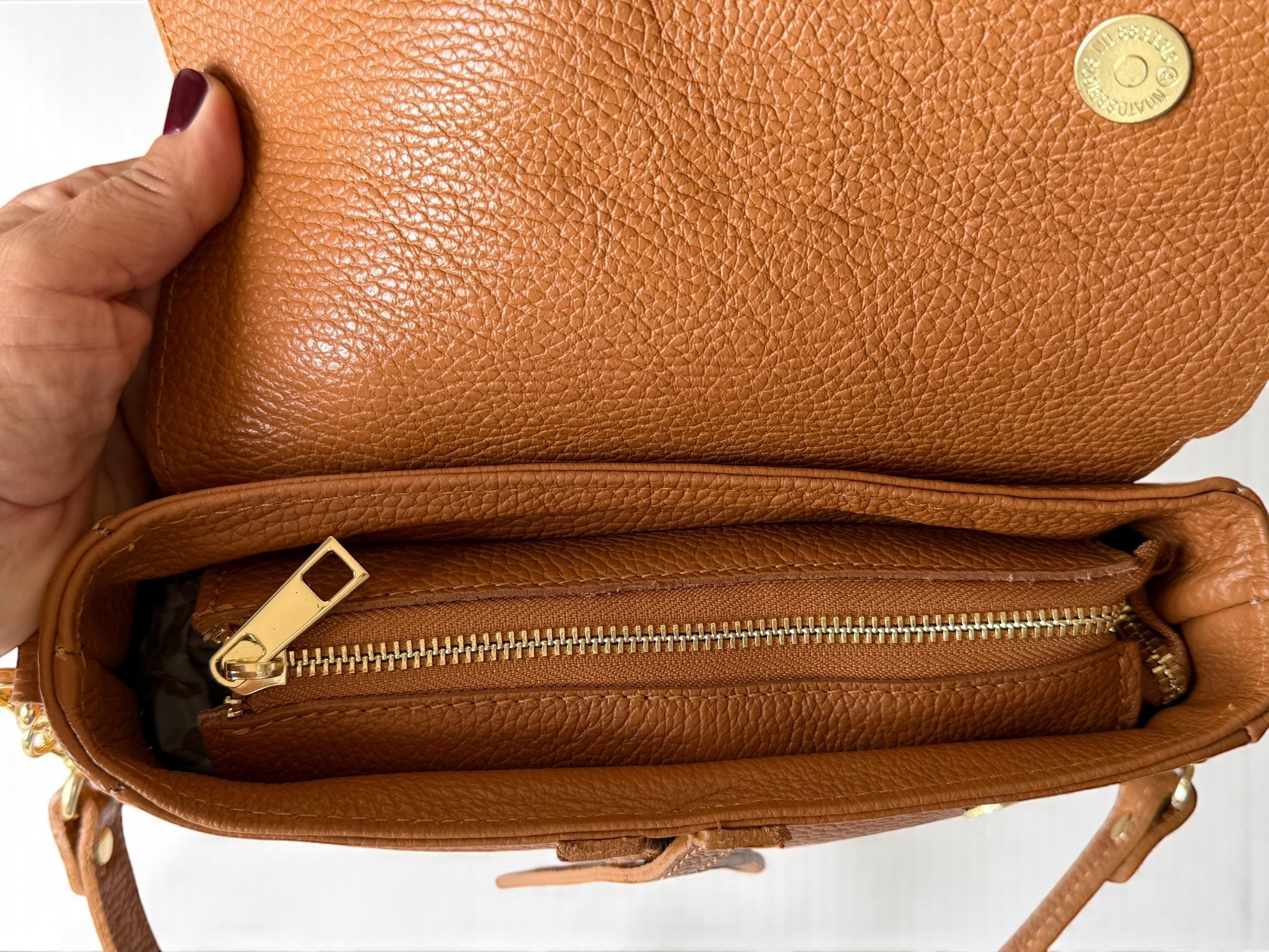 Asymmetric pebbled leather Saddle Flap Bag