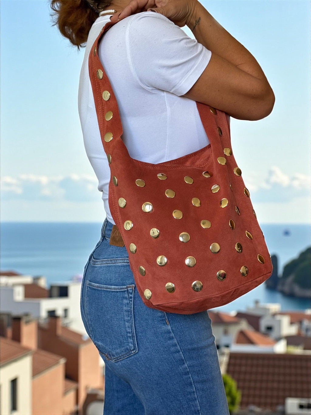 Terracotta Italian suede bag with oversized gold-tone studs Paloma Palomo