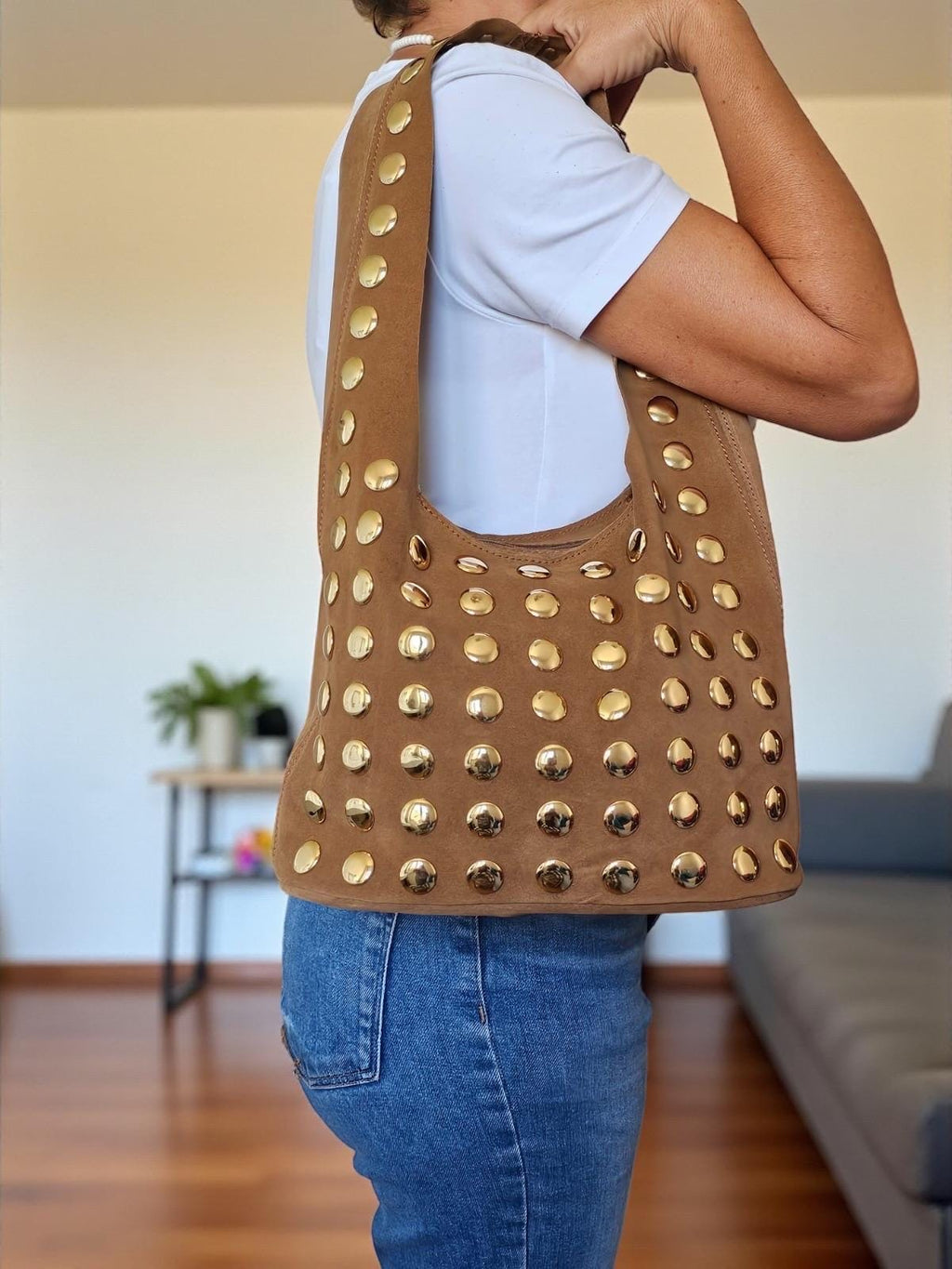 Medium Italian suede shoulder bag with rows of oversized gold studs