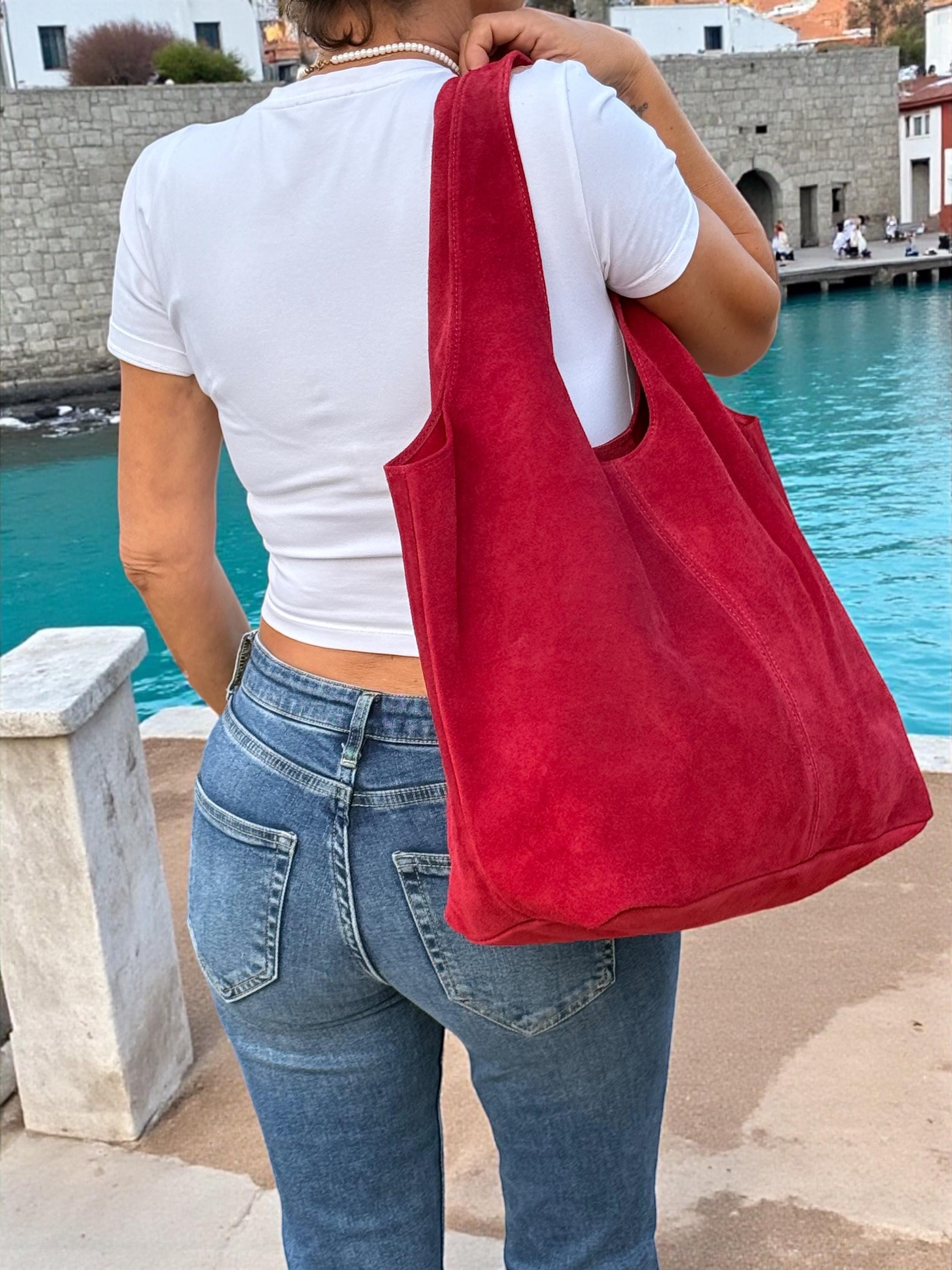 Red suede oversize bag