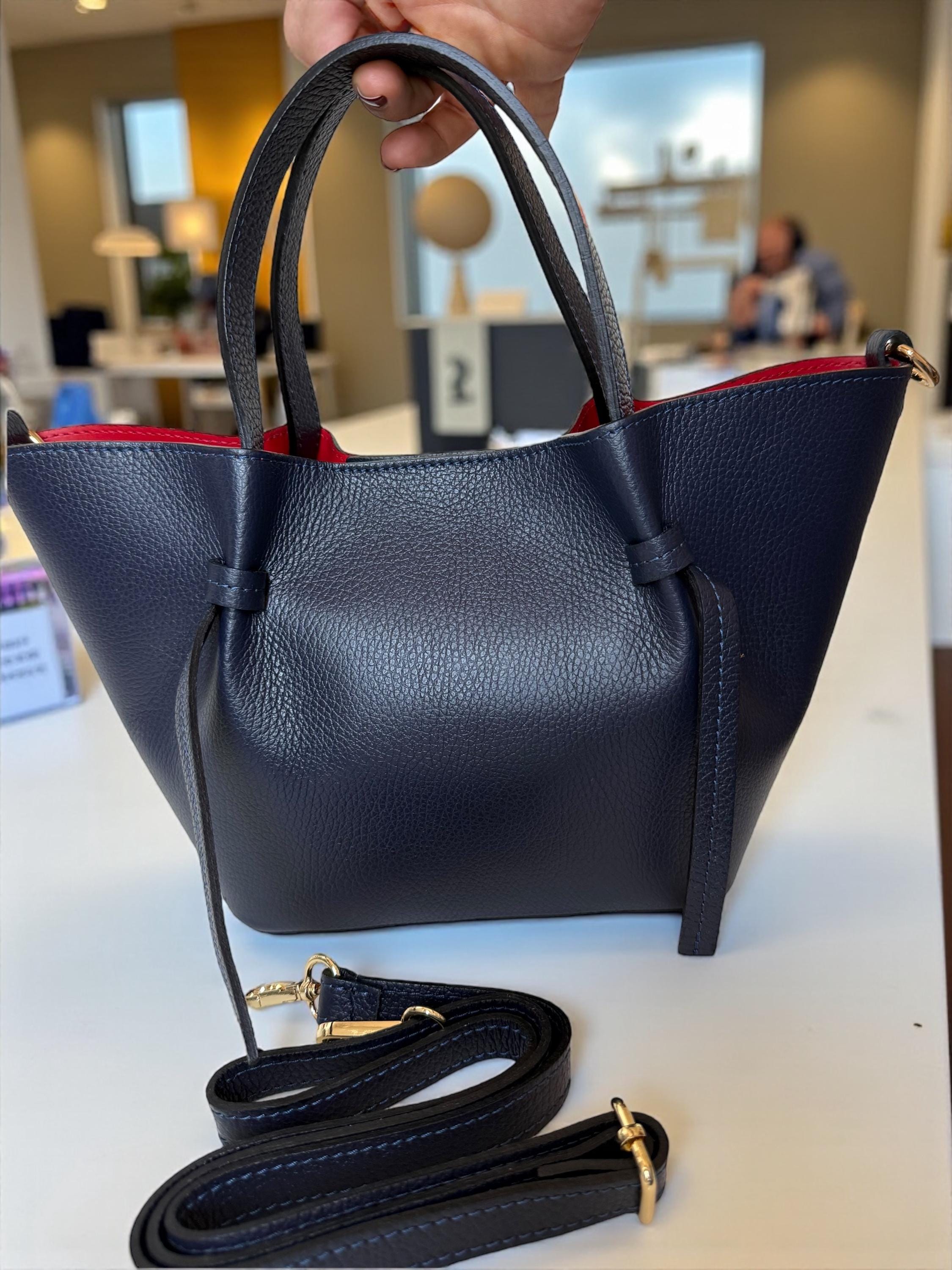 Navy blue structured trapezoid leather bag with top handles