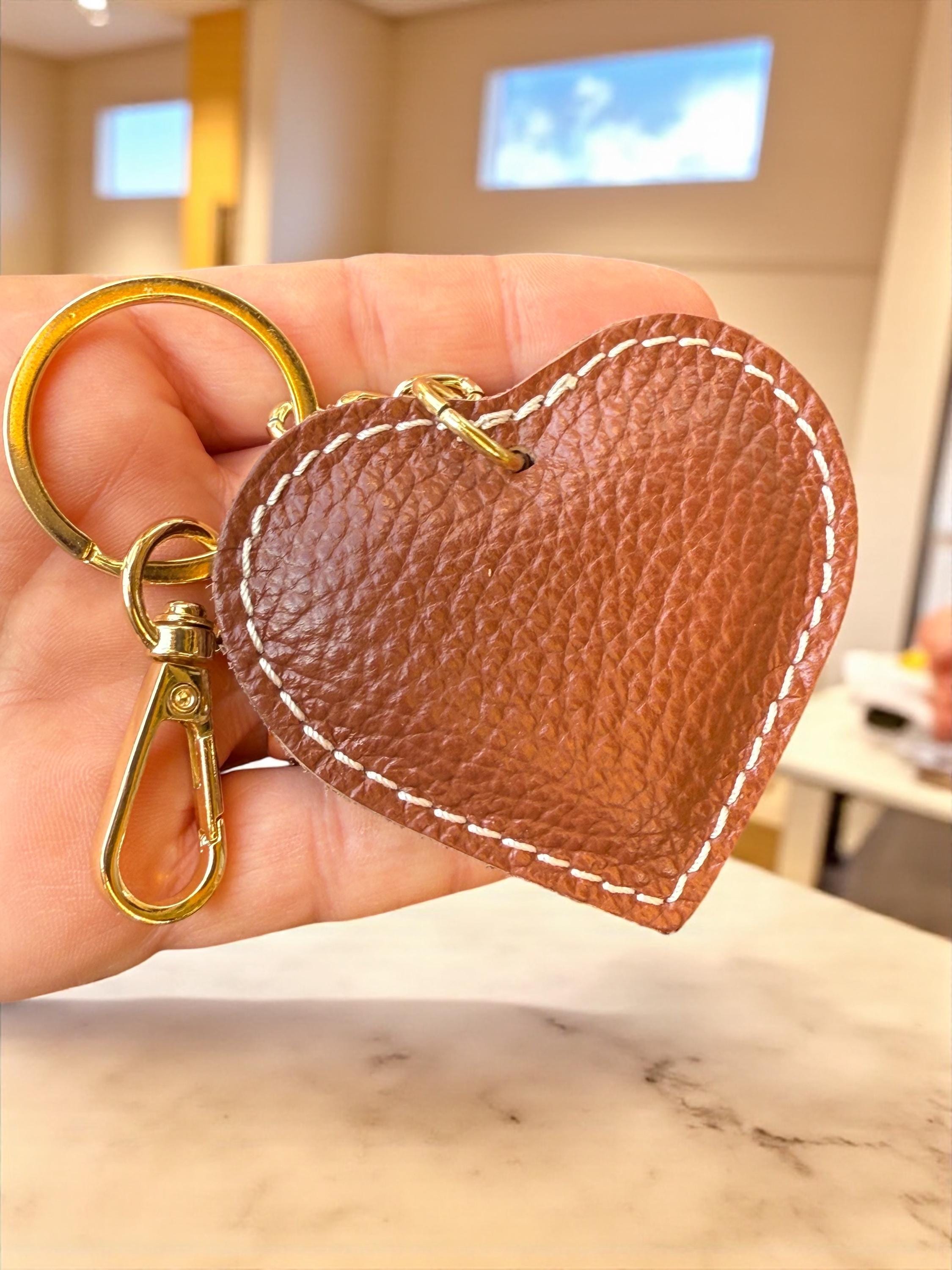 Classic camel tan leather heart keychain with gold-tone clasp