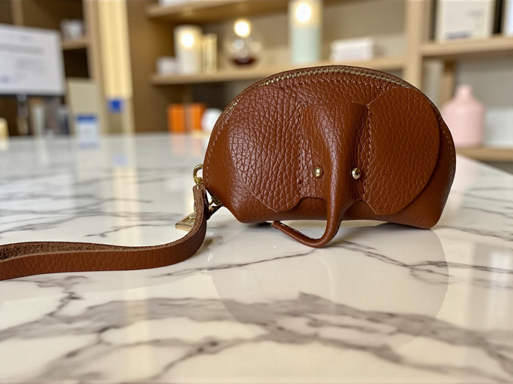 Elephant leather pouch with wrist strap used as a decorative bag charm