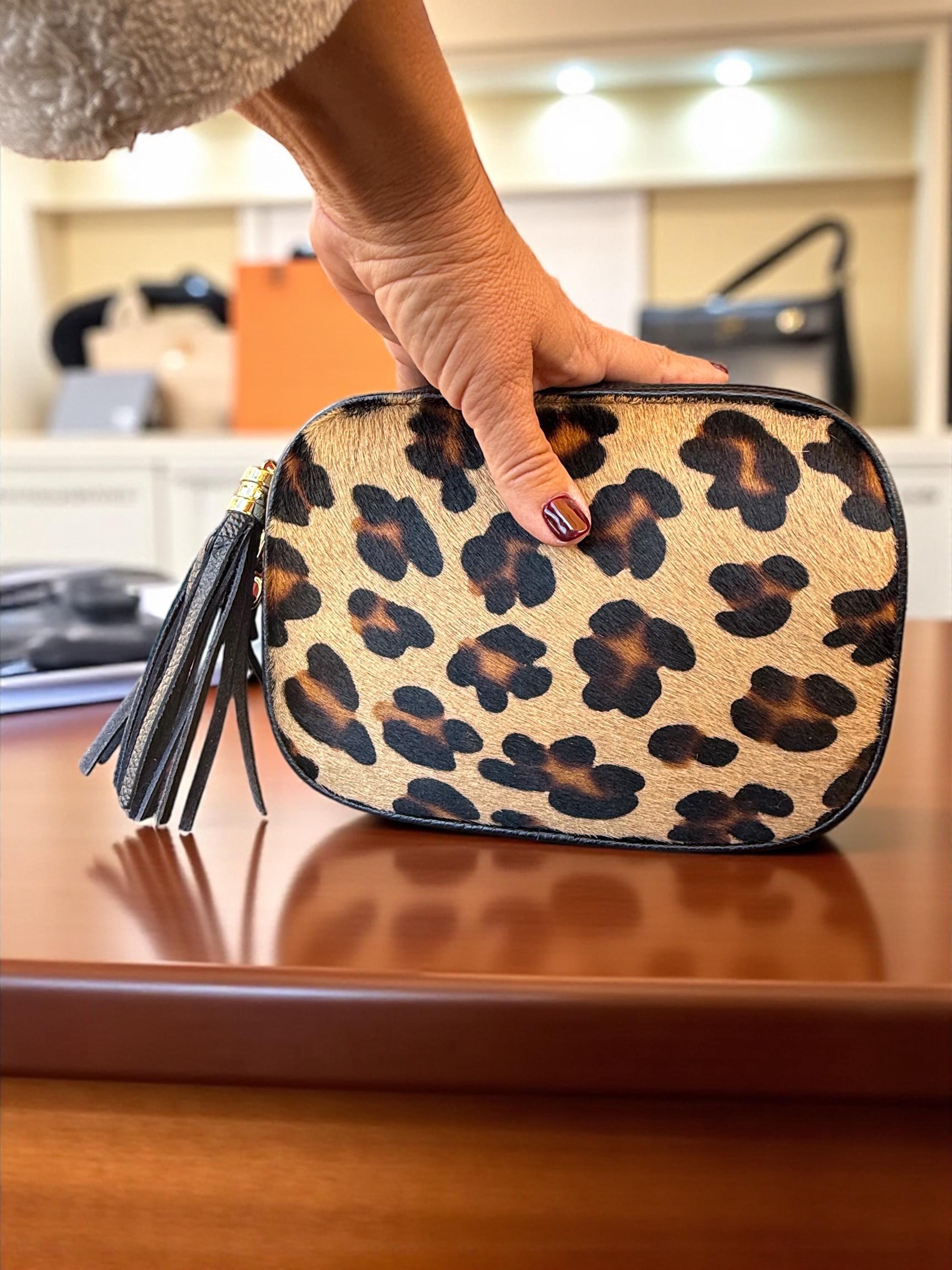 animal print pony hair leather handbag
